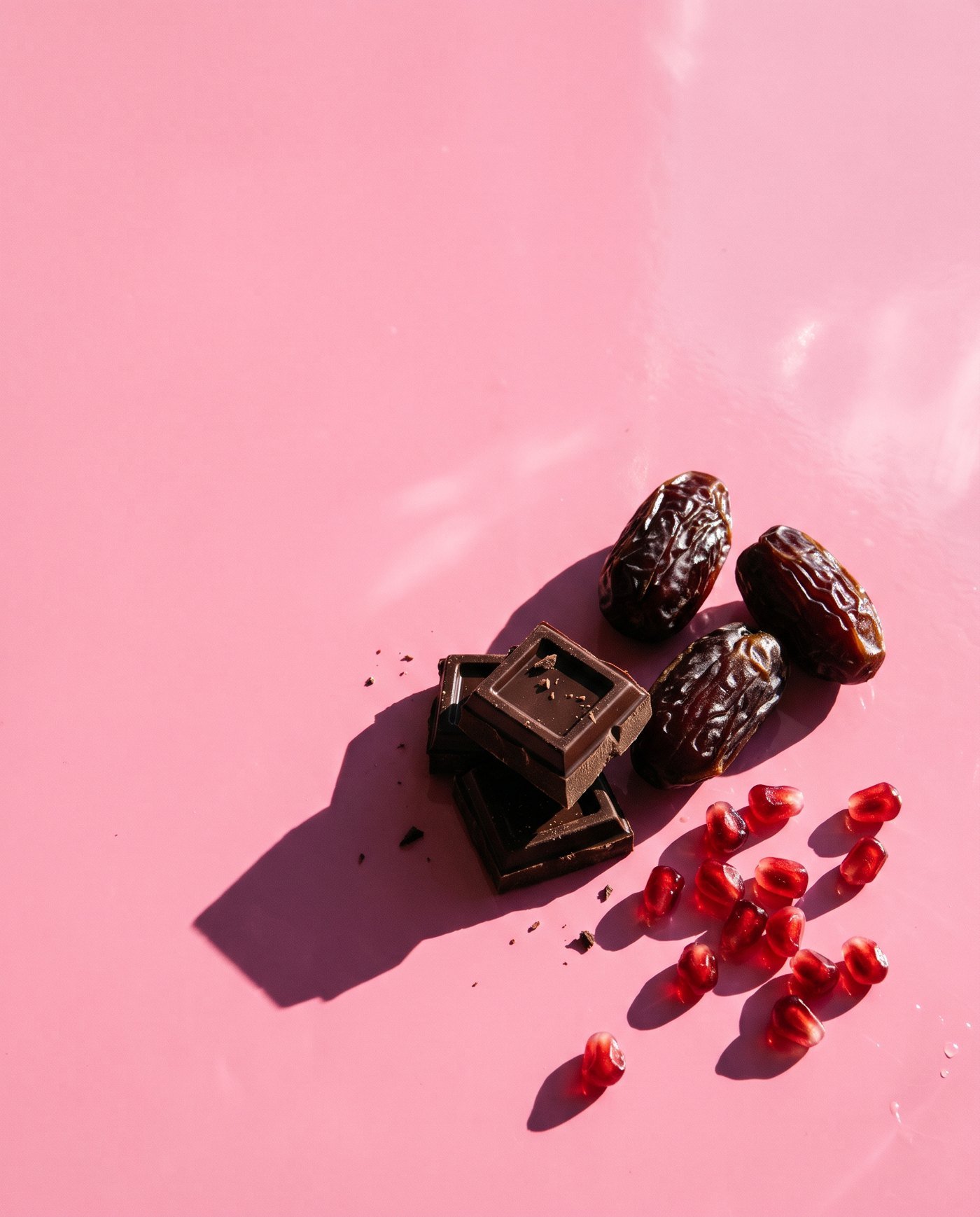 Dark chocolate, dates and pomegranate seeds