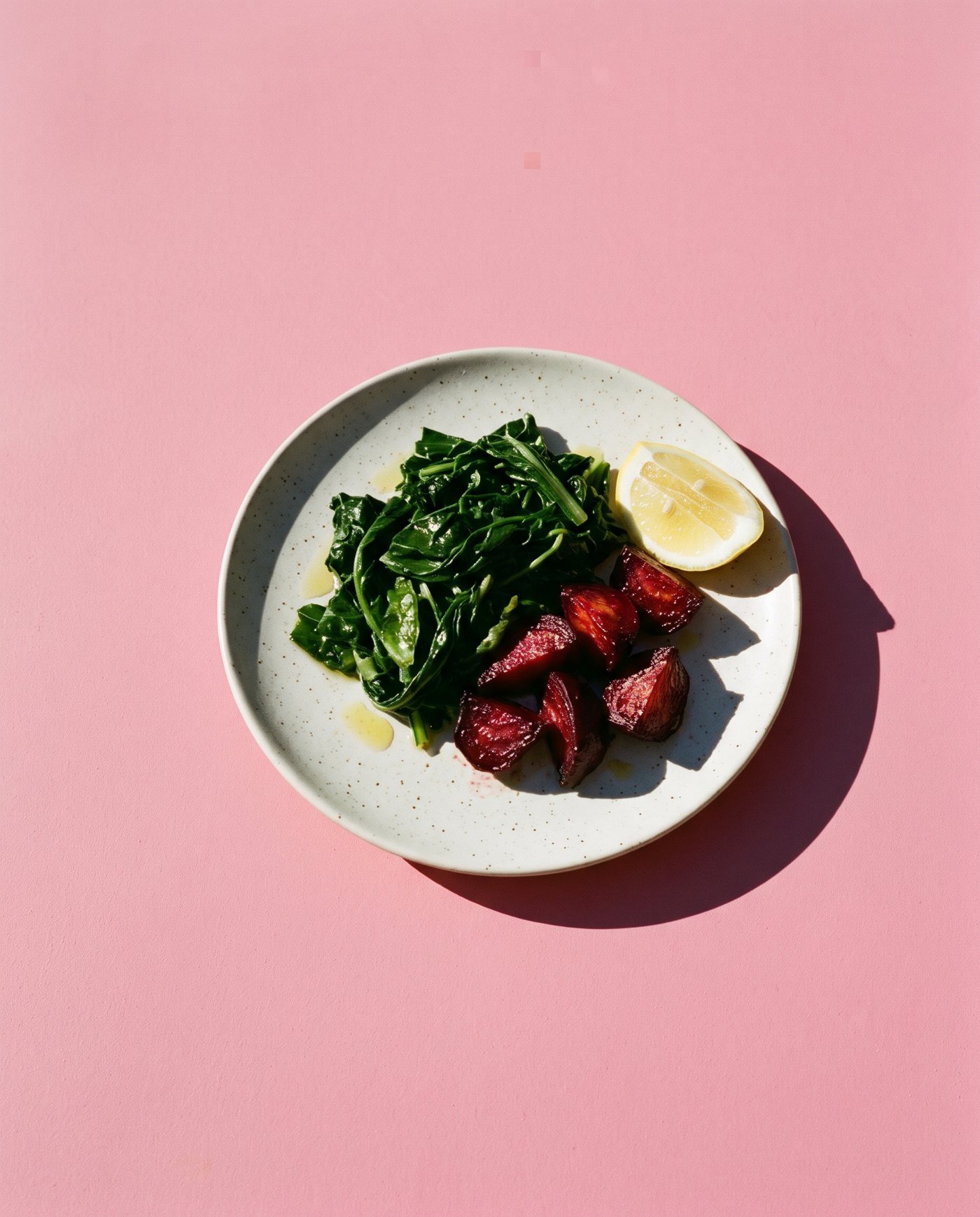 Steamed greens, beetroot and a wedge of lemon