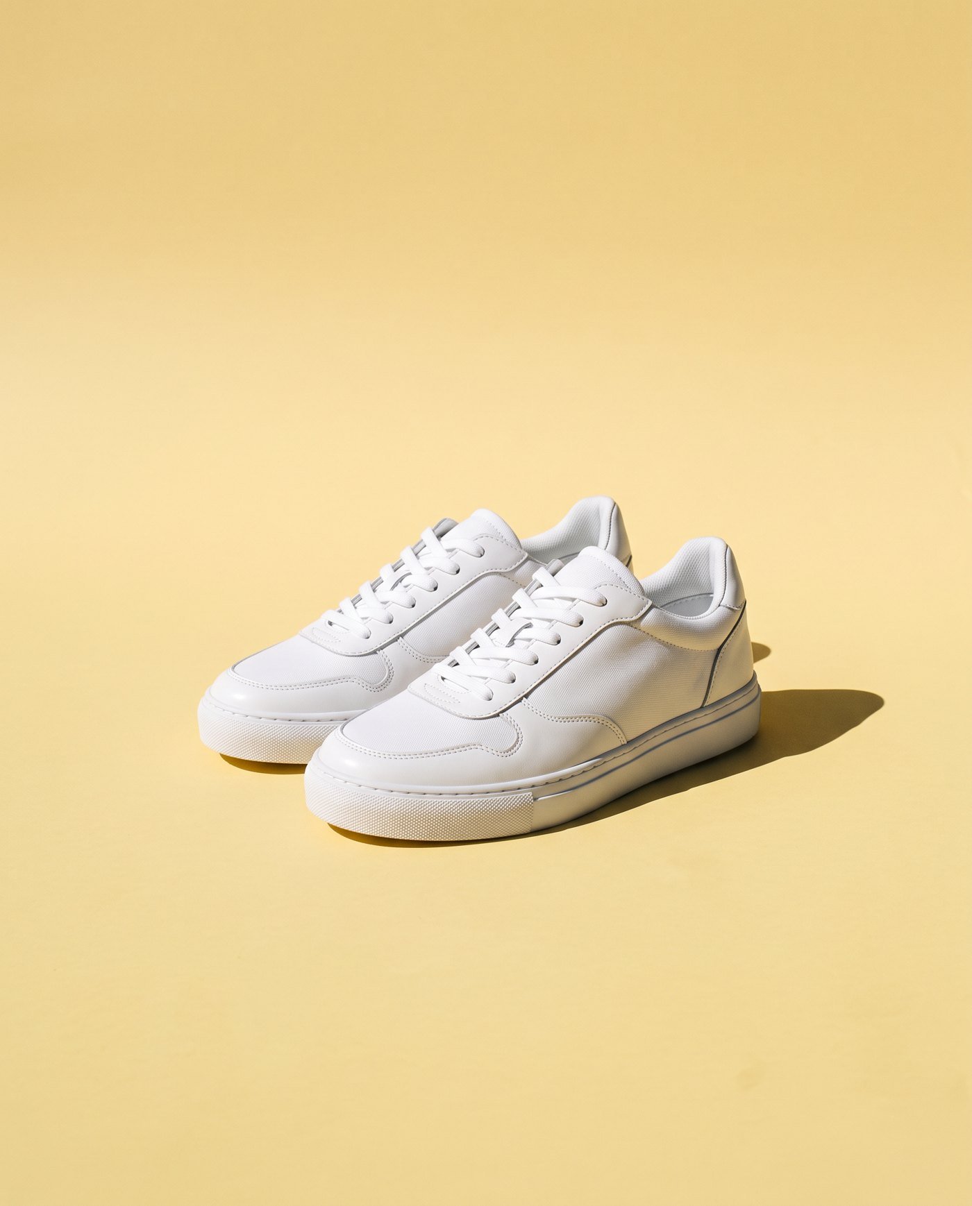 A pair of white trainers
